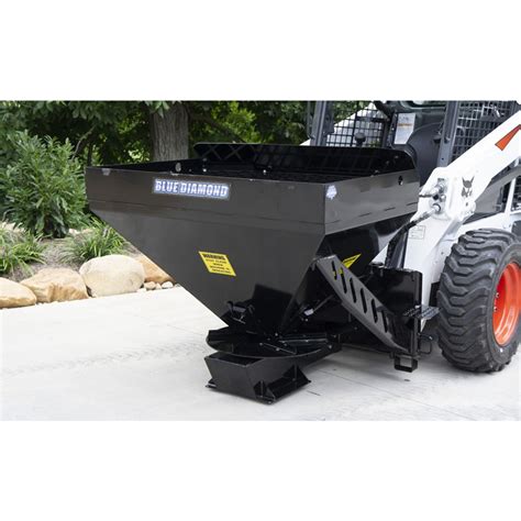 skid steer stone spreader|material spreaders for skid steer.